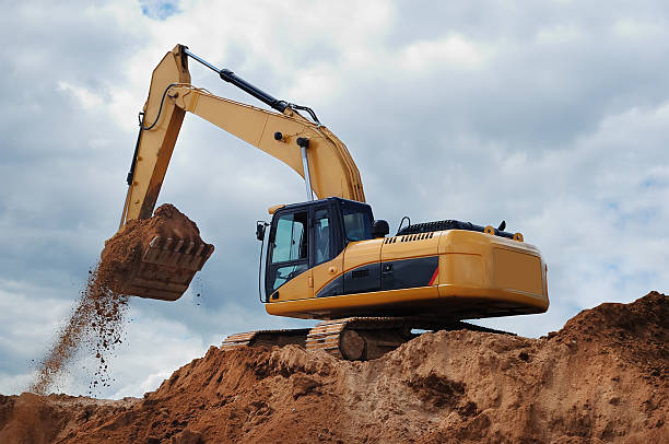 istock Excavator with earth in the bucket 92051391