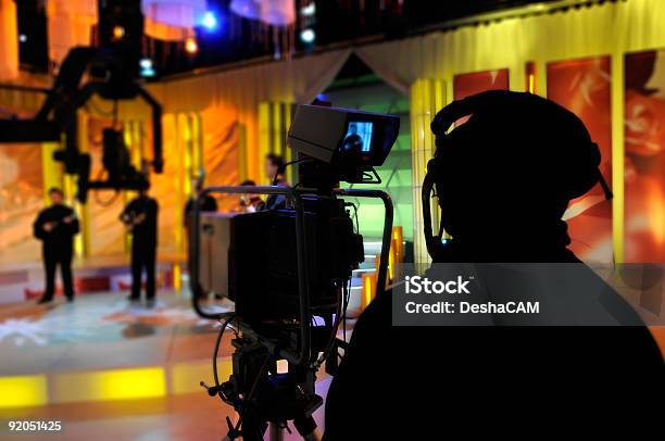 Cameraman Records Show In A Tv Studio Stock Photo - Download Image Now - Television Set, Studio - Workplace, Industry