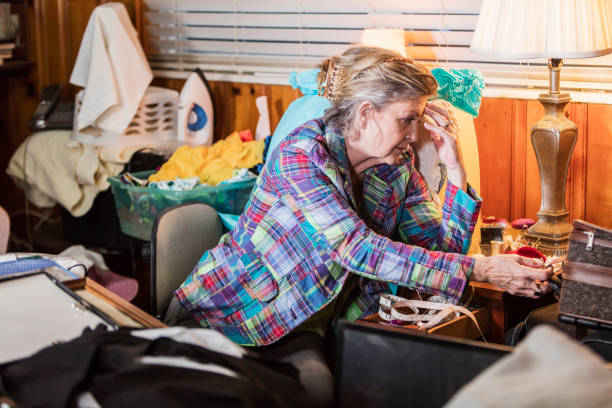 istock Senior woman at home, messy room 920516316