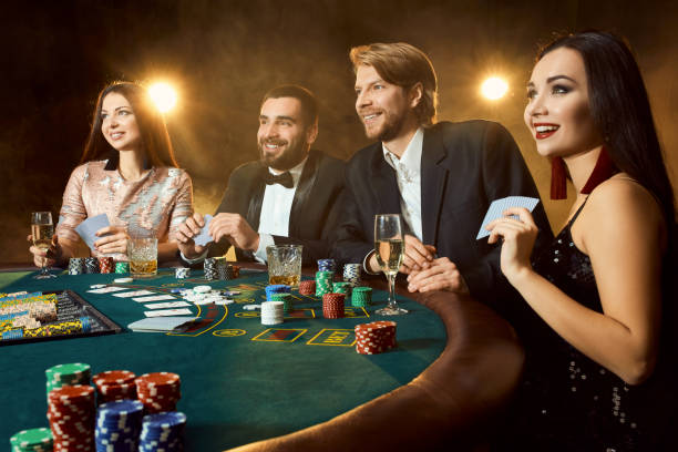 upper class friends gambling in a casino - political party concepts glamour friendship imagens e fotografias de stock