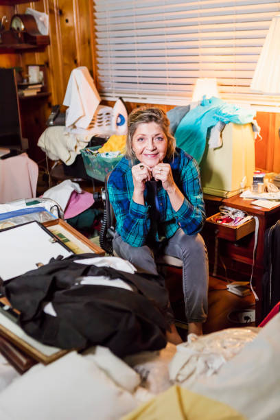 istock Senior woman at home, messy room 920516708