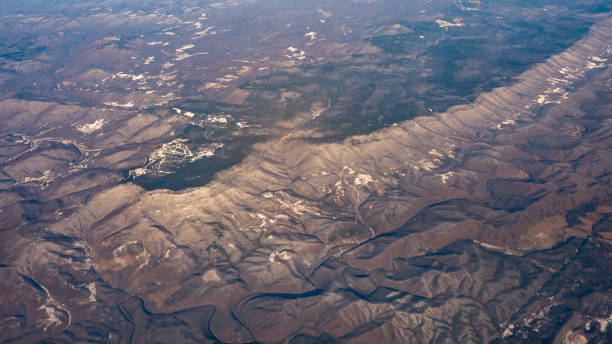 istock Snowed Mountain PEaks Viewed from Airplane Window 920519416