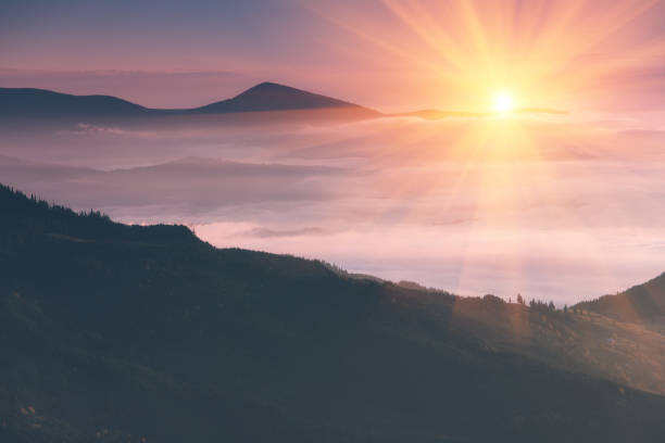 Beautiful landscape in the mountains at sunrise. stock photo