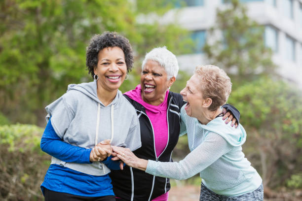 istock Three older multi-ethnic women hanging out together 920522084