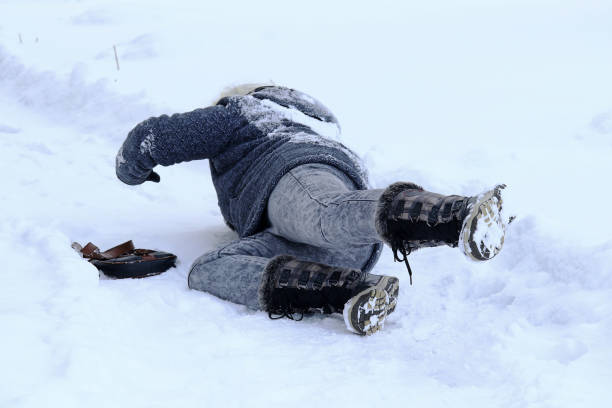 istock A woman doing slips on the winter road 920522220
