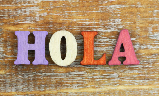 istock Hola (Hello in Spanish) written with colorful wooden letters 920525394