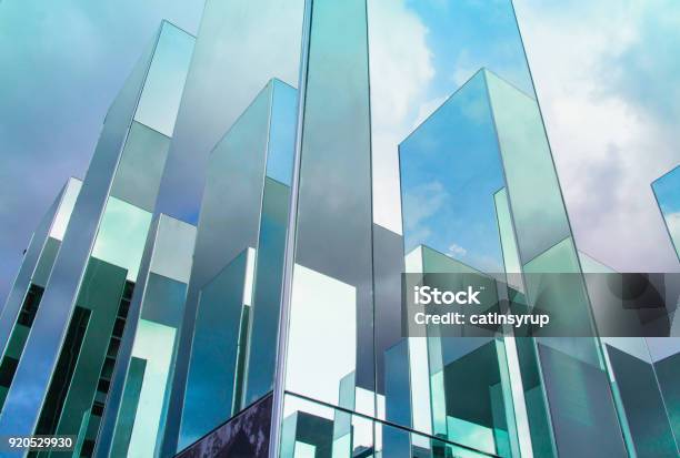 Bottom View Of Reflection Of Blue Sky On Building Mirror Abstract Background Stock Photo - Download Image Now