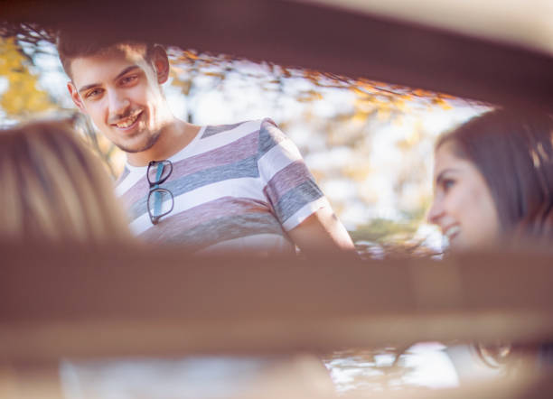 istock Young friends having a great time outdoor and talking 920538686
