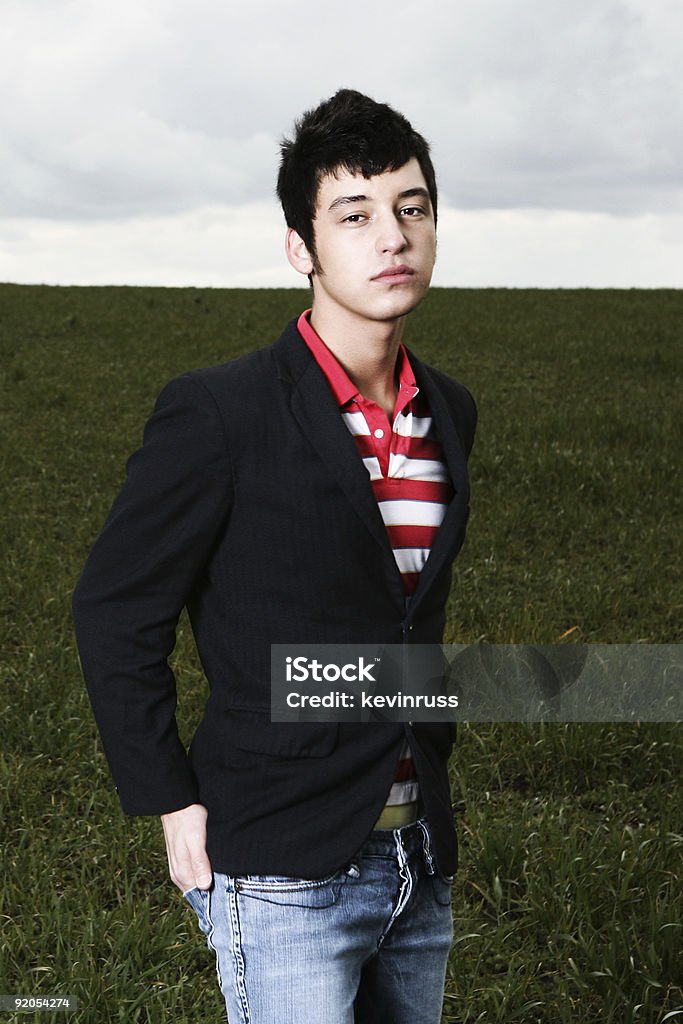 Elegante joven en rayas. - Foto de stock de A la moda libre de derechos