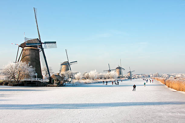 Ancient windmills at Kinderdijk in the Netherlands stock photo