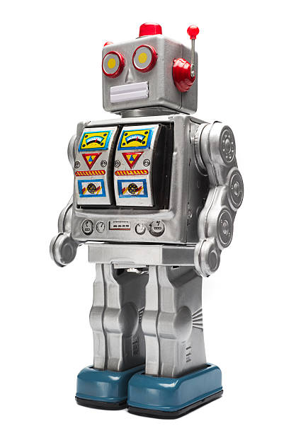 Silver toy tin robot with icons stock photo
