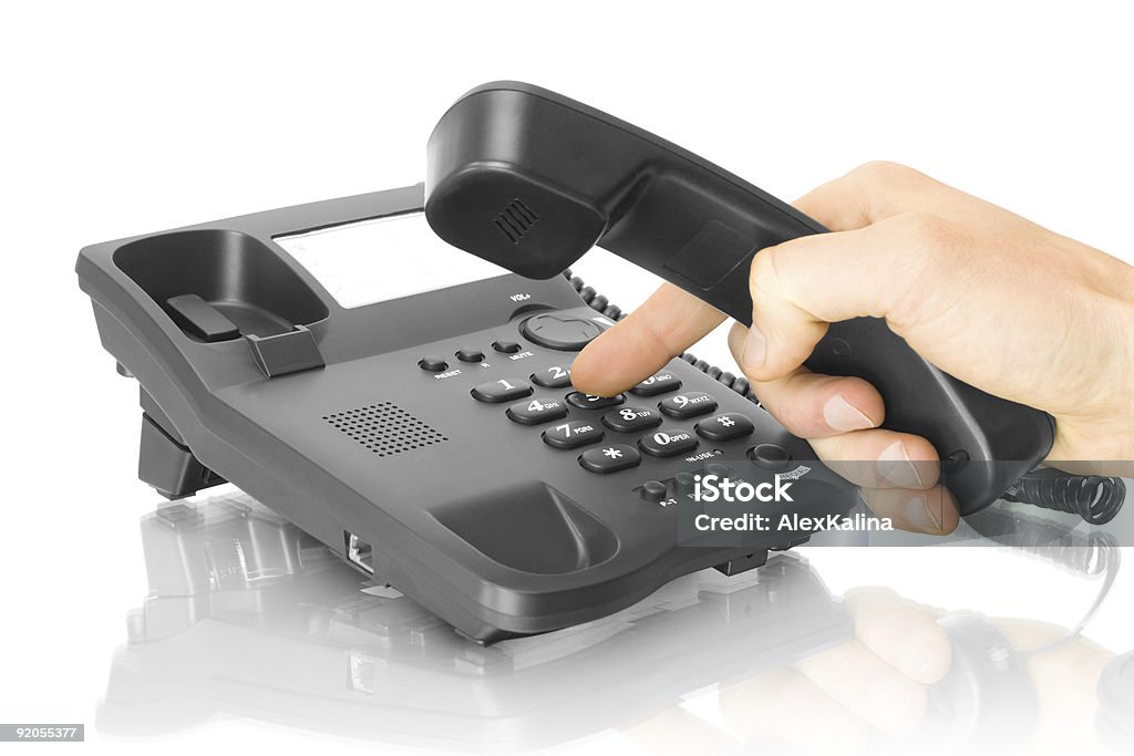 office telephone with hand  Color Image Stock Photo