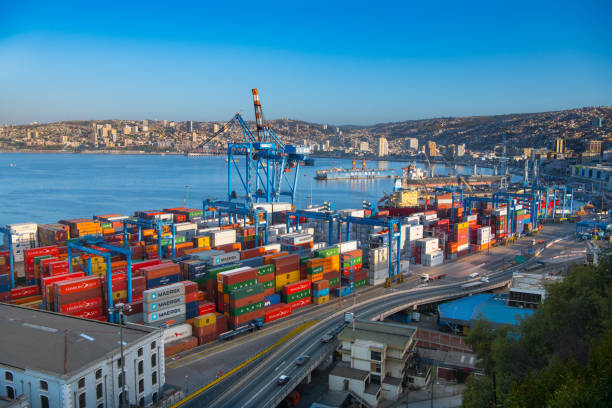 Containers ready for shipping Multi colored transportation containers just about to be loaded on business transportation vessels.Multi colored transportation containers just about to be loaded on business transportation vessels. valparaiso chile stock pictures, royalty-free photos & images