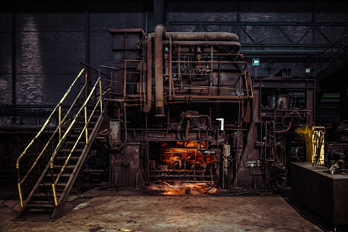 interior of an old abandoned steel factory in western Europe