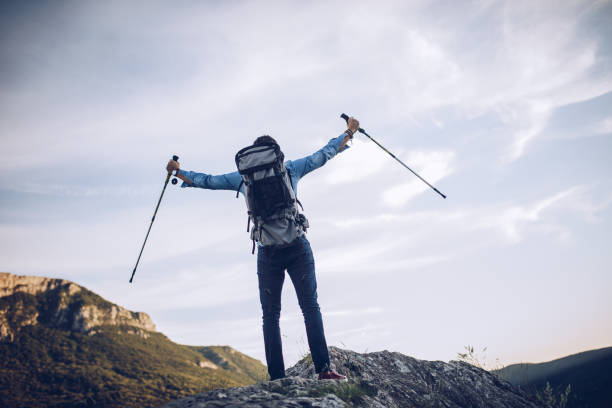 istock Man on top of the mountain 920581736