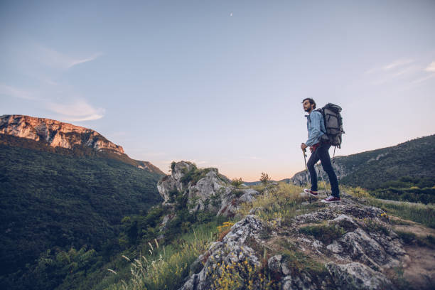 istock Hiker climbing on the mountain 920583874