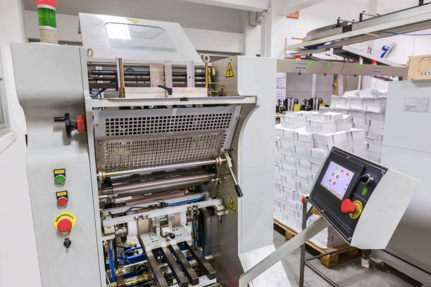 istock Industrial printer machine with monitor control panel of factory printer. 920593820