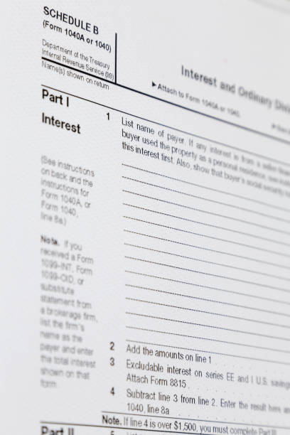 istock 1040 Tax Form with a shallow depth of field 920594040