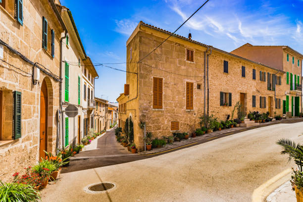 Majorca Spain, idyllic streets at the old town of Alcudia Beautiful view of streets in the old town of Alcudia, Spain Balearic islands bay of alcudia stock pictures, royalty-free photos & images