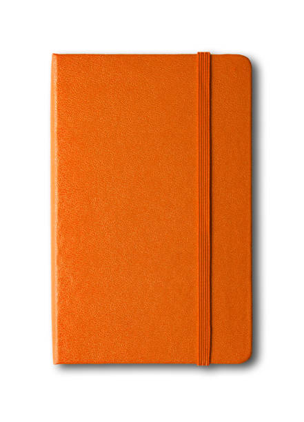 naranja cerrado portátil aislado en blanco - note pad leather diary book fotografías e imágenes de stock