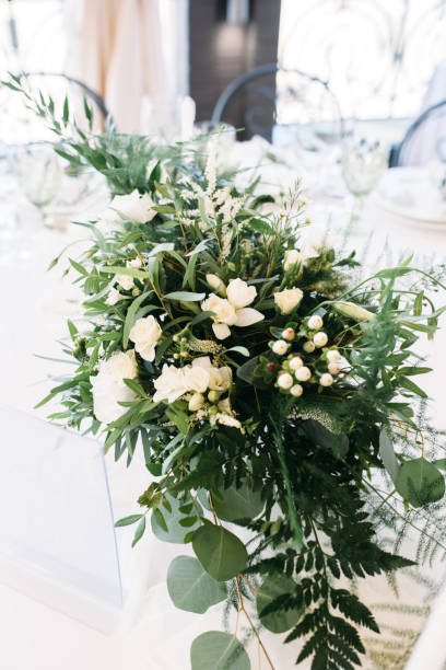 istock bouquet with white flowers, eucalyptus and greens 920612590