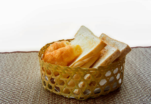 Bread. Bread slice. Bread white. Bread on wood. Bread on table. Bread background. Bread for breakfast. Bread is bakery. Bread bake. Bread for eat. Bread from wheat. Bread for morning. Bread from flour