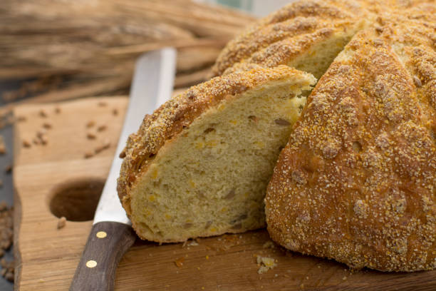 istock Homemade baked round bread with corn and wheat 920631356