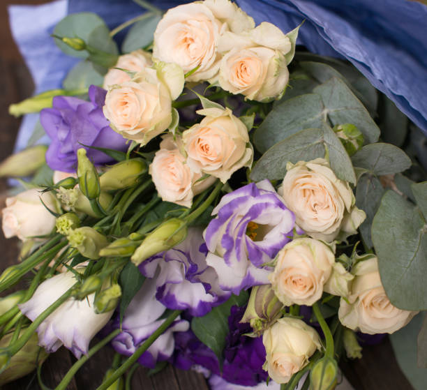 istock Closeup of a Beautiful Roses and Eustoma Bouquet. 920637480
