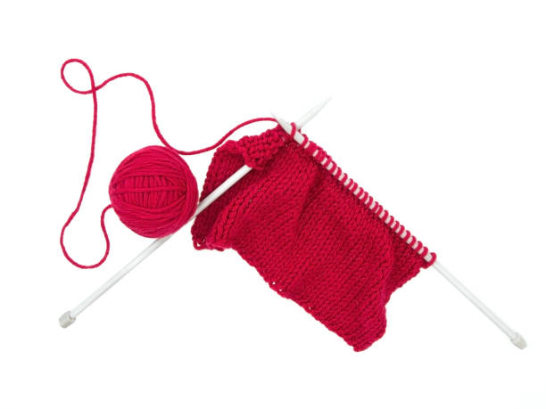 istock Hand knitting wool, yarn and needles isolated on white. 920638214