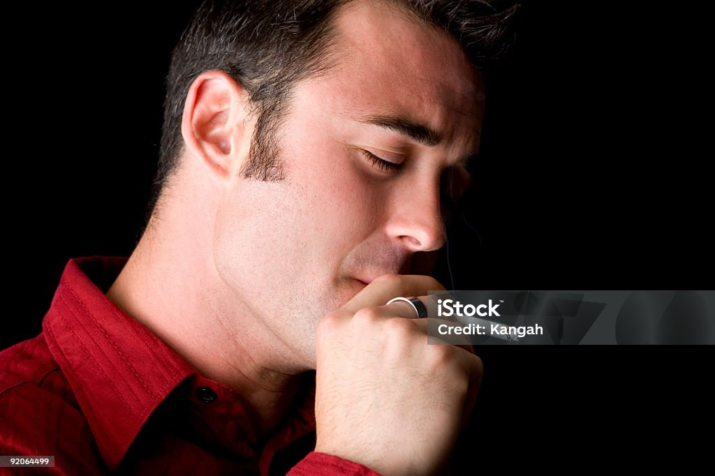 Addiction Male inhaling a cigarette. Chemical Stock Photo