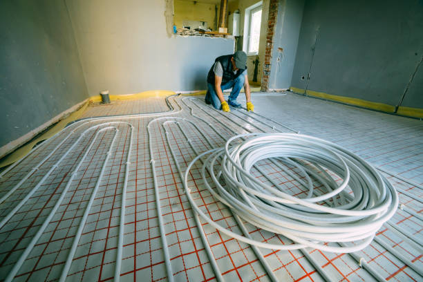 Pipefitter installing system of heating. Repair in the apartment