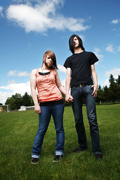 istock Young Couple Outside in a Field 92064609