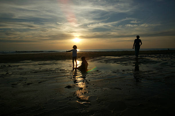 istock family frolics on sunset beach 92064850