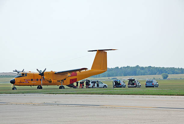 istock Airplane picking up skydivers in the morning 92064875