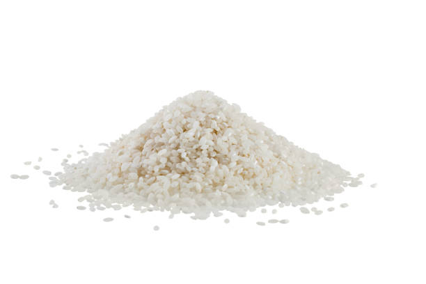 istock Pile of rice heap solated on white blackground 920656864