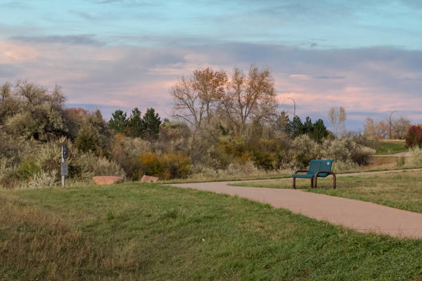 Majestic View Park An empty paved walkway through a city park.  At Majestic View Park in Arvada, Colorado. arcada stock pictures, royalty-free photos & images