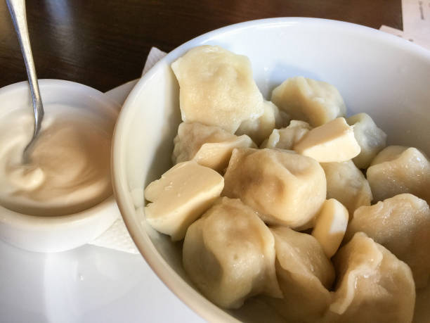istock Russian pelmeni with butter, 920659648