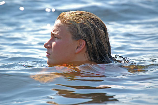 istock Teen swimming headshot 92066754