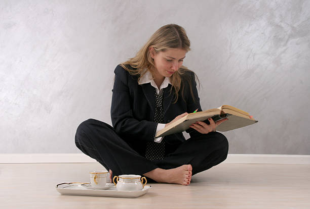 istock Woman, reading a book and drinking coffee 92066906