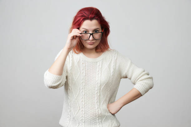 istock Woman in glasses with confused and gloomy expression 920684010