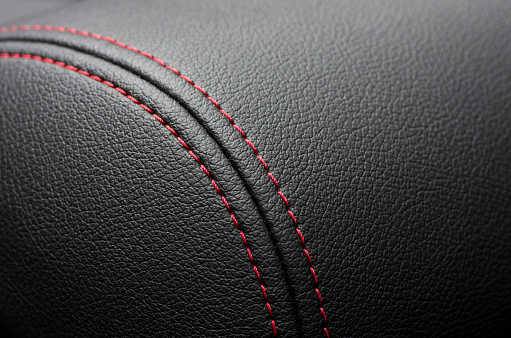 Close up of Car leather interior details with stitch.
