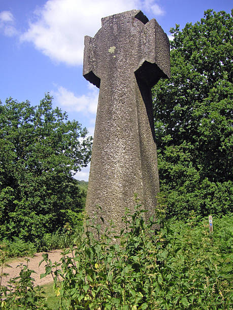 Religious cross in the stinging nettles stock photo