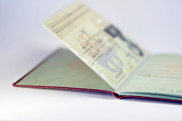 An opened German passport against a white background