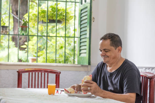 istock Brazilian man at home 920698520