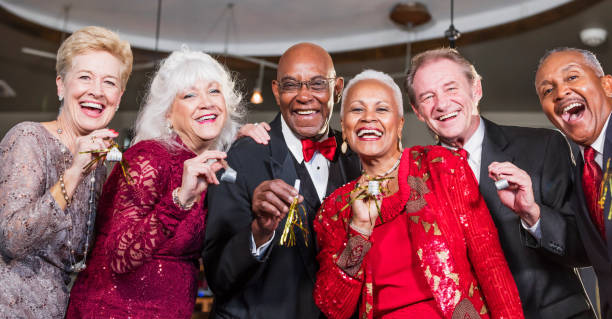istock Multi-ethnic group of seniors having party 920709530