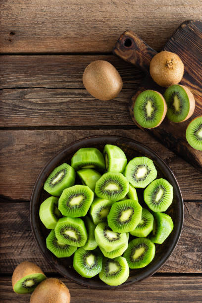 istock Kiwi fruit on wooden rustic table, ingredient for detox smoothie 920710452
