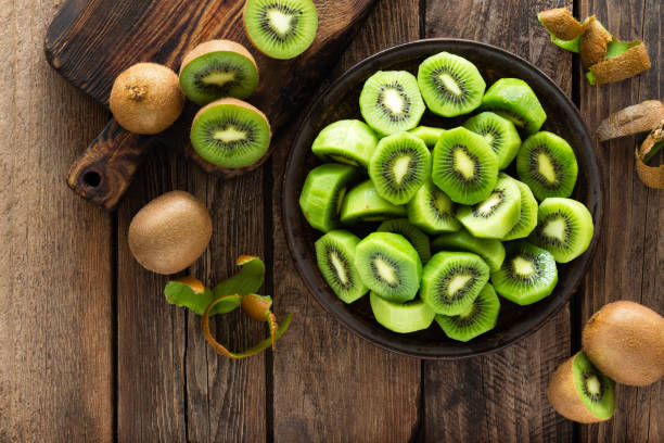 istock Kiwi fruit on wooden rustic table, ingredient for detox smoothie 920710498
