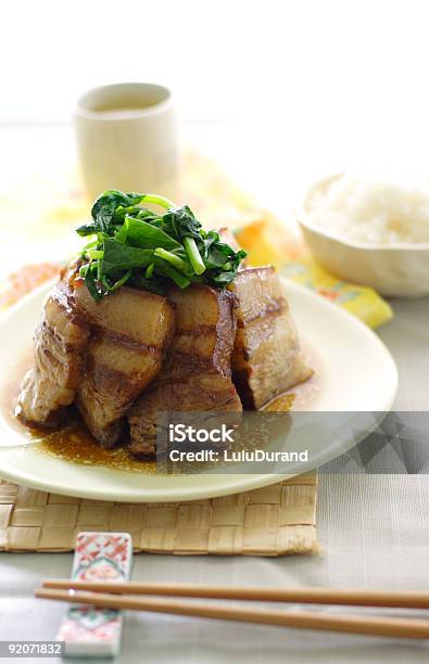 China Estofado De Vientre De Cerdo Con Mostaza Verde Foto de stock y más banco de imágenes de Alimento