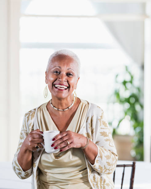 istock Senior African-American woman with coffee cup 920723390