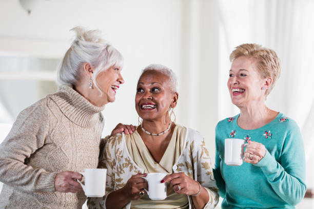 istock Three multi-ethnic senior women socializing over coffee 920723594